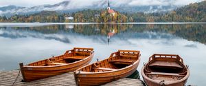 Preview wallpaper boat, lake, trees, buildings, reflection