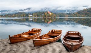 Preview wallpaper boat, lake, trees, buildings, reflection