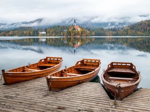 Preview wallpaper boat, lake, trees, buildings, reflection