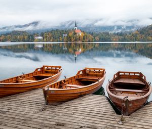 Preview wallpaper boat, lake, trees, buildings, reflection