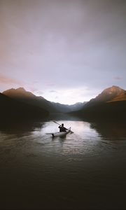 Preview wallpaper boat, loneliness, rocks, paddle, silhouette