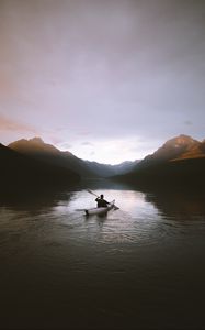 Preview wallpaper boat, loneliness, rocks, paddle, silhouette