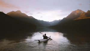 Preview wallpaper boat, loneliness, rocks, paddle, silhouette