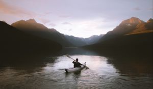 Preview wallpaper boat, loneliness, rocks, paddle, silhouette