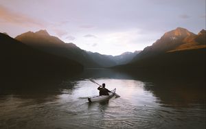 Preview wallpaper boat, loneliness, rocks, paddle, silhouette