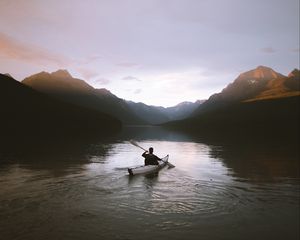 Preview wallpaper boat, loneliness, rocks, paddle, silhouette