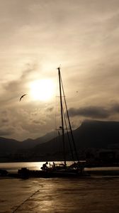 Preview wallpaper boat, mast, lake, mountains, dark