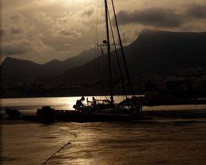 Preview wallpaper boat, mast, lake, mountains, dark