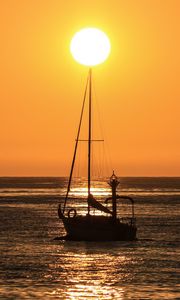 Preview wallpaper boat, mast, sea, horizon, sun, dark