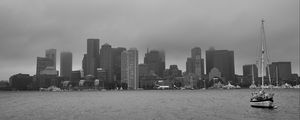 Preview wallpaper boat, mast, sea, buildings, city, black and white