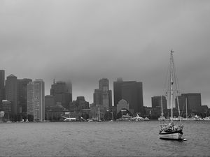 Preview wallpaper boat, mast, sea, buildings, city, black and white