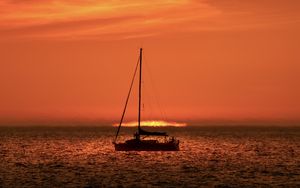 Preview wallpaper boat, mast, sea, sunset, dark