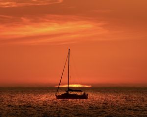 Preview wallpaper boat, mast, sea, sunset, dark