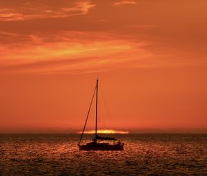 Preview wallpaper boat, mast, sea, sunset, dark