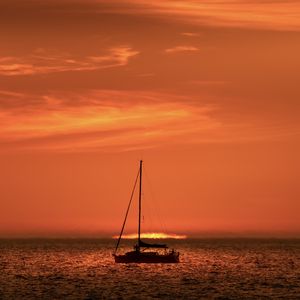 Preview wallpaper boat, mast, sea, sunset, dark