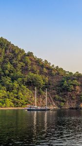 Preview wallpaper boat, masts, lake, hill, trees