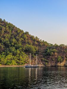 Preview wallpaper boat, masts, lake, hill, trees
