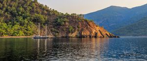Preview wallpaper boat, masts, lake, hill, trees