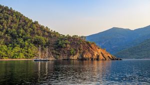 Preview wallpaper boat, masts, lake, hill, trees