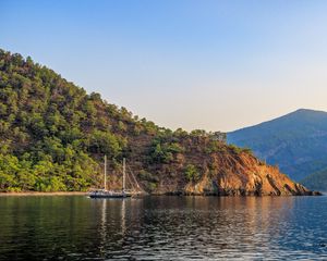 Preview wallpaper boat, masts, lake, hill, trees