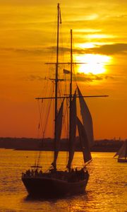 Preview wallpaper boat, masts, sails, sea, sunset