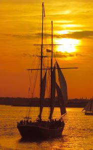 Preview wallpaper boat, masts, sails, sea, sunset