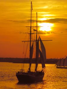 Preview wallpaper boat, masts, sails, sea, sunset