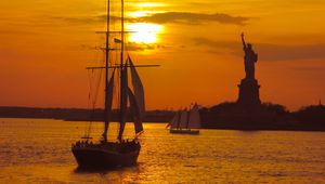 Preview wallpaper boat, masts, sails, sea, sunset
