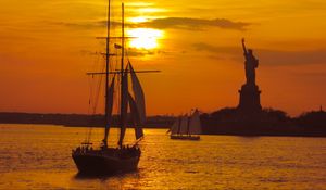 Preview wallpaper boat, masts, sails, sea, sunset