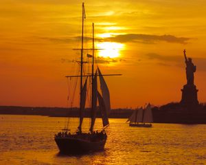 Preview wallpaper boat, masts, sails, sea, sunset