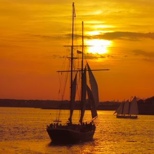 Preview wallpaper boat, masts, sails, sea, sunset