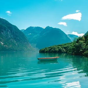 Preview wallpaper boat, mountains, lake, water, horizon