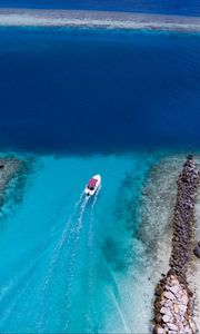 Preview wallpaper boat, ocean, stones, aerial view