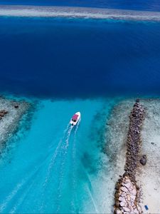 Preview wallpaper boat, ocean, stones, aerial view