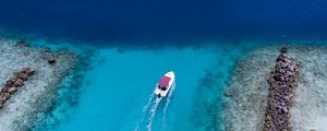 Preview wallpaper boat, ocean, stones, aerial view