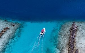 Preview wallpaper boat, ocean, stones, aerial view