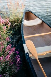 Preview wallpaper boat, paddle, coast, flowers, water