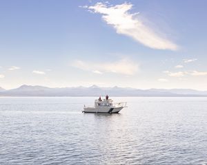 Preview wallpaper boat, people, sea, waves, mountains, sky