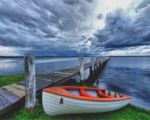 Preview wallpaper boat, pier, coast, reservoir, cloudy, evening