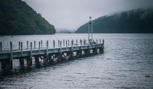 Preview wallpaper boat, pier, lake, ship, mountains