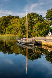 Preview wallpaper boat, pier, river, reflection