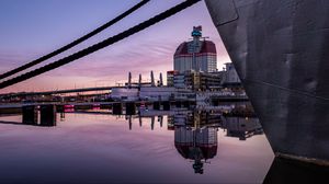 Preview wallpaper boat, pier, water, reflection, city, buildings, twilight