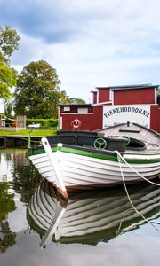 Preview wallpaper boat, river, buildings, trees