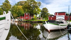 Preview wallpaper boat, river, buildings, trees