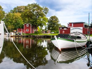 Preview wallpaper boat, river, buildings, trees