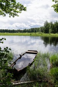 Preview wallpaper boat, river, water, grass, shore, trees