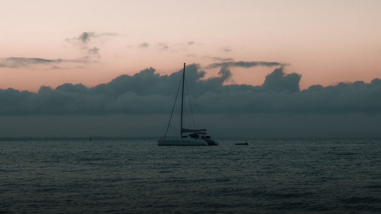 Wallpaper boat, sail, ocean, clouds, horizon, twilight