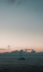 Preview wallpaper boat, sail, ocean, clouds, horizon, twilight