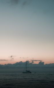 Preview wallpaper boat, sail, ocean, clouds, horizon, twilight