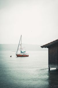 Preview wallpaper boat, sail, rain, fog, water